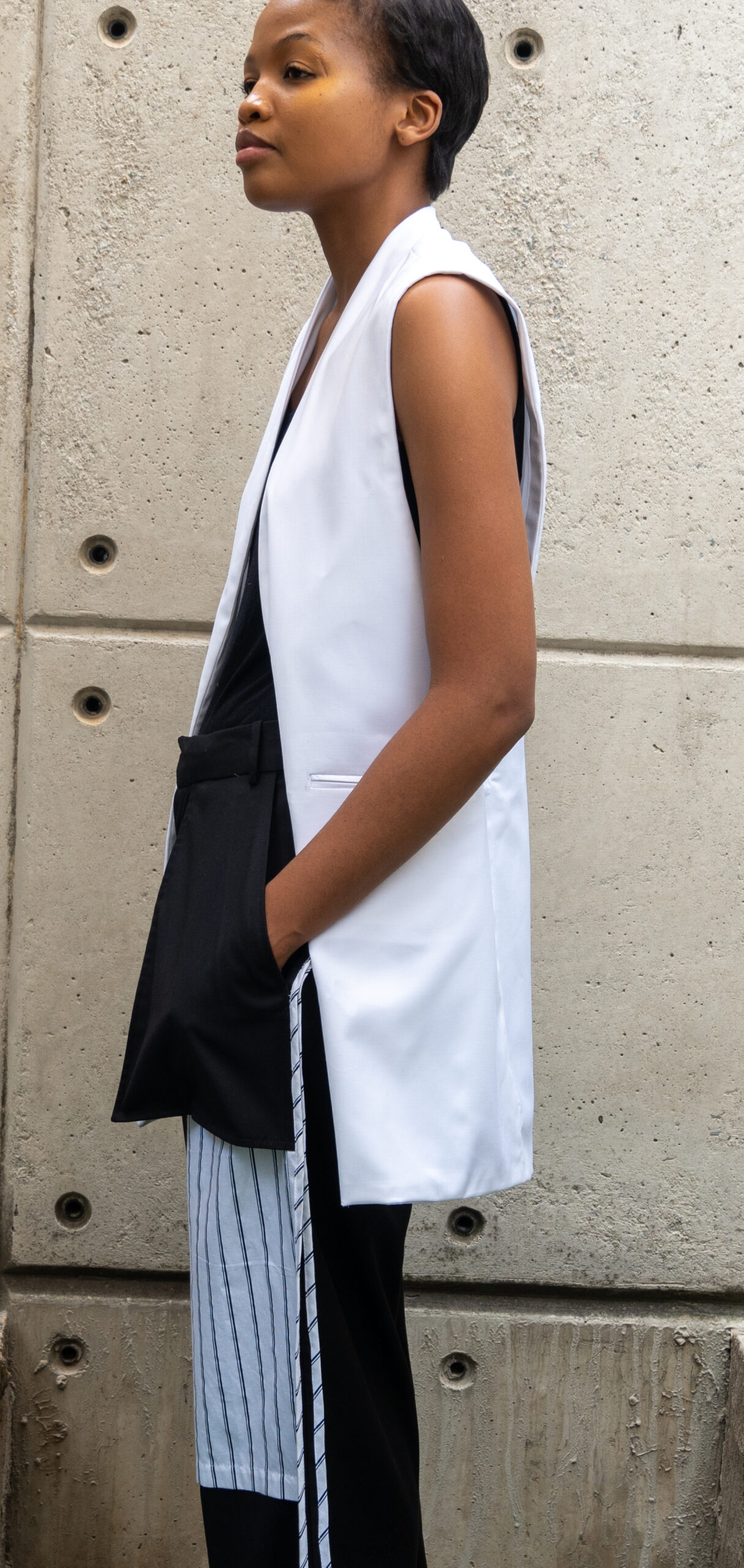 Elevated mimimalism - A woman wearing a White Stylish Duster Waistcoat