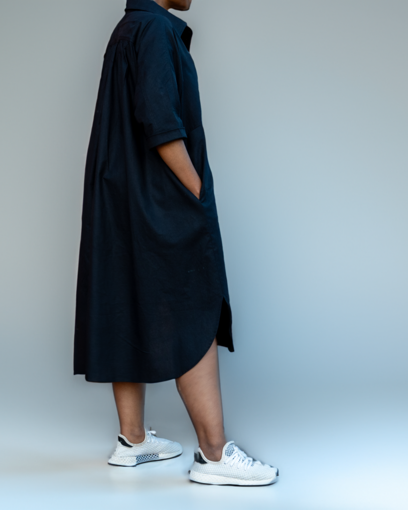 A woman wearing a plus size dress