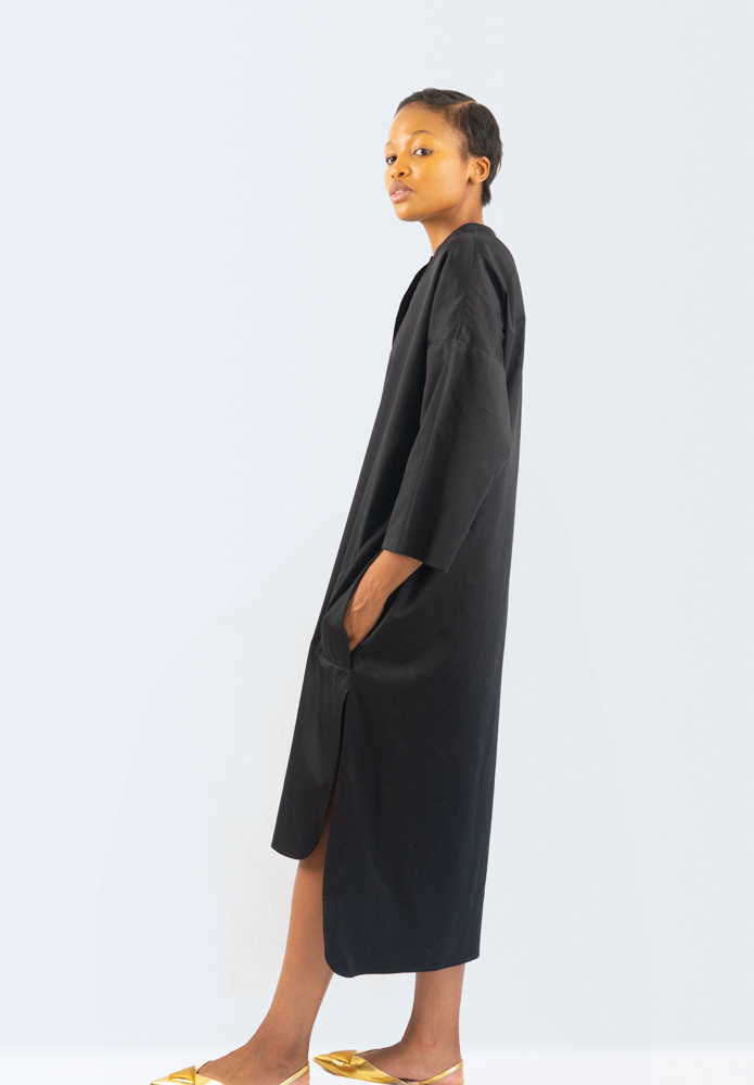 Shirt dress side - A side view of a collarless shirt dress with placket