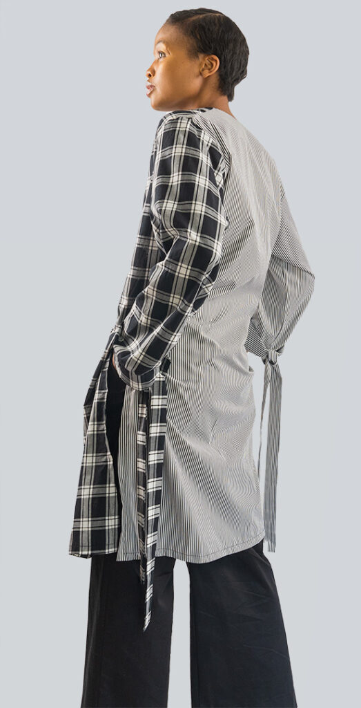 A back and side view of a woman wearing asymmetric wrap top