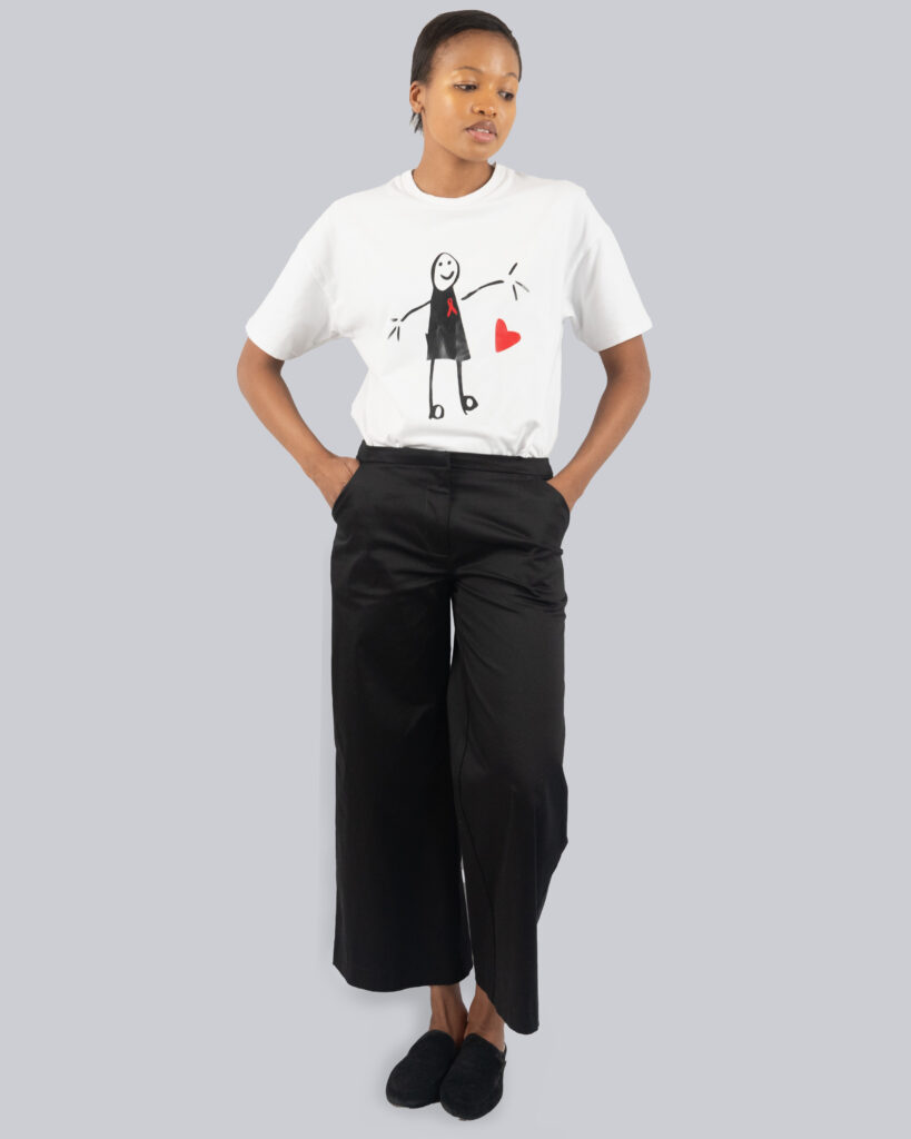 Black wide leg pants with tshirt - A woman wearing wide leg black pants
