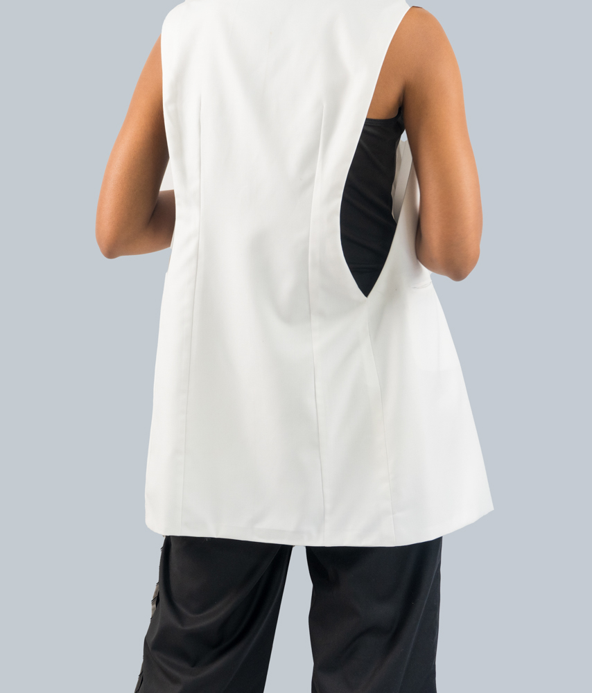 White Duster back - A back view of a woman wearing white top