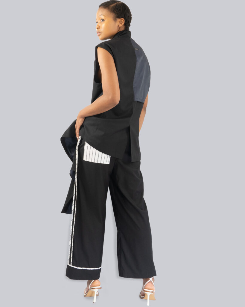 A woman wearing stylish wide leg pants