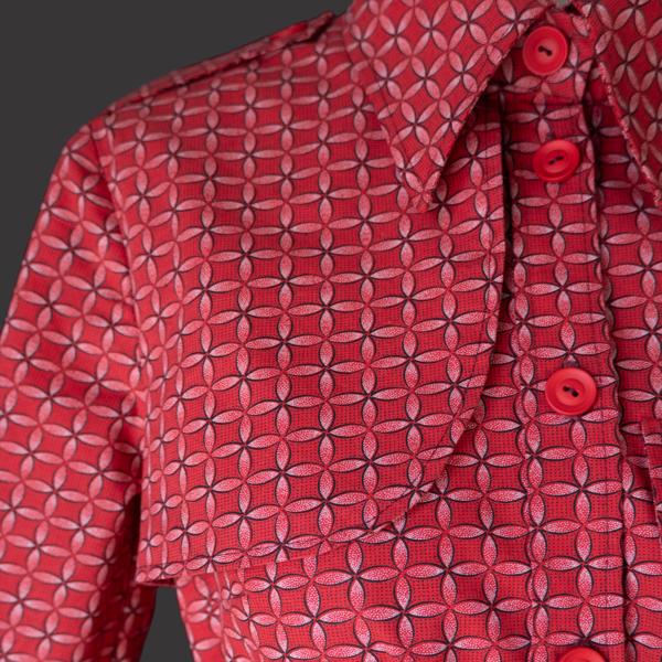 a front overlay of a red shweshwe dress