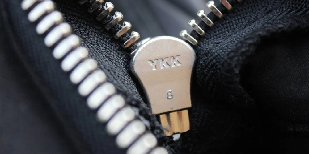 ykk.jpg - An image of a zip showing YKK zipper as a sign of clothing quality