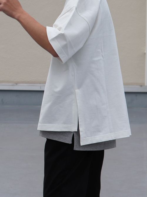 T-shirt - WhiteT-shirt layered on top of grey T-shirt