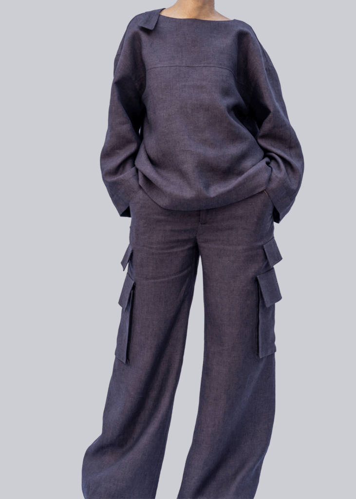 Front view — brown linen strap-front top with relaxed boxy silhouette and wide sleeves